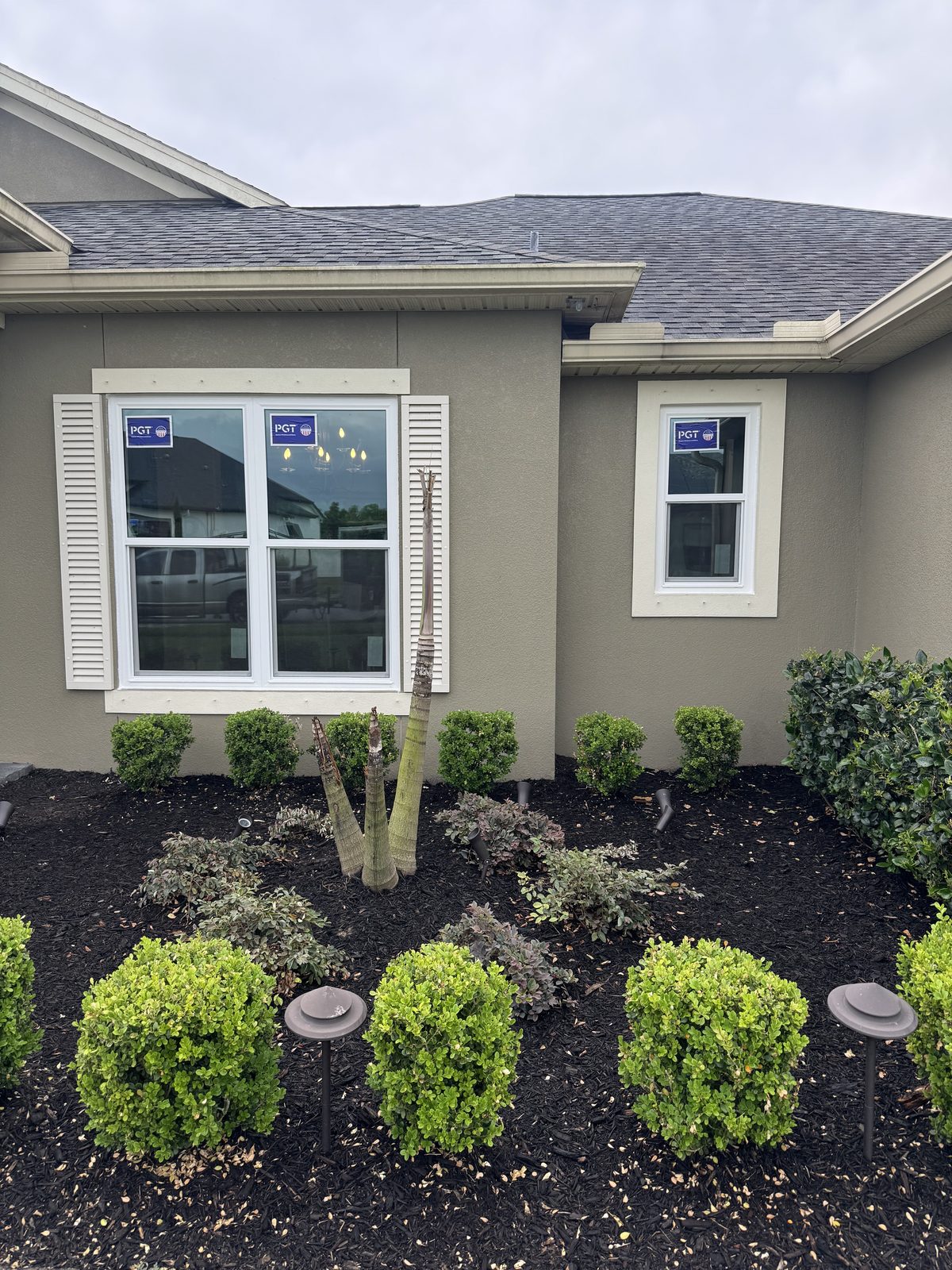 Home exterior with new PGT windows